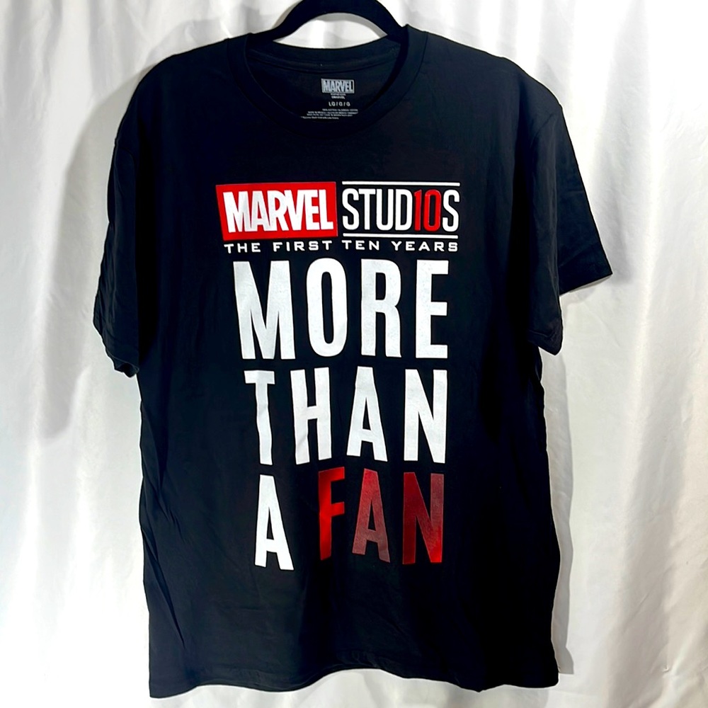 Marvel Studios “More Than A Fan” licensed tee, w back print. Size Large